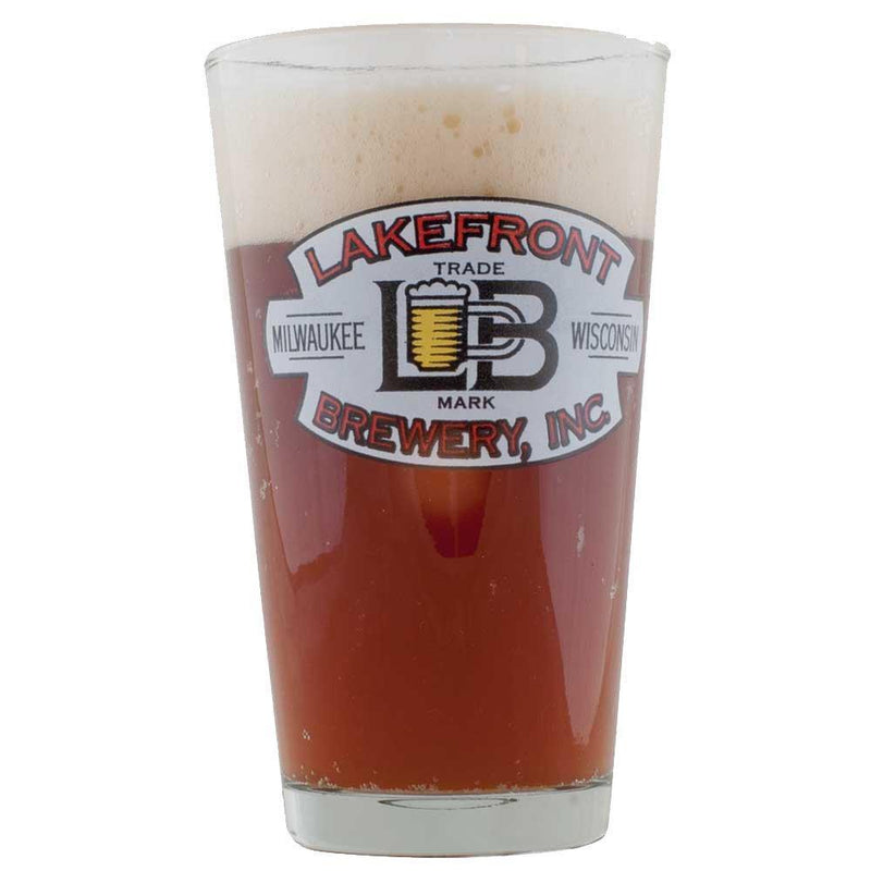 A Lakefront brewing glass filled with Lakefront Brewery's bridge burner homebrew