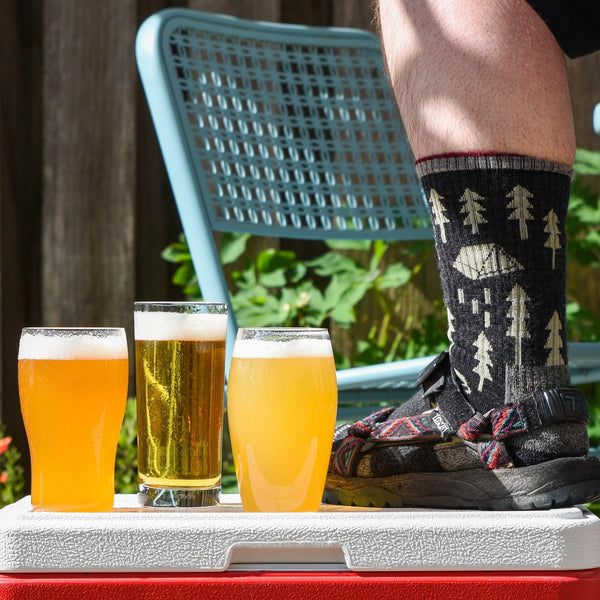 Socks & Sandals Summer Extract Beer Variety Pack with Patrick's Foot wearing socks and sandals on a cooler