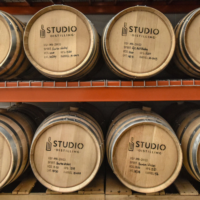 Close up of studio barrels on rack
