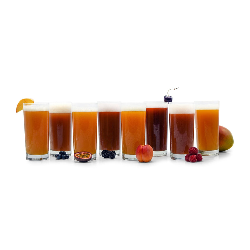 A swath of Funktional Fruit Sour beers with respective fruits beside their glasses