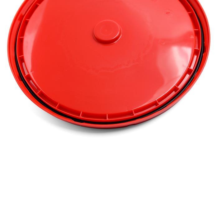 Underside view of the red grometed lid