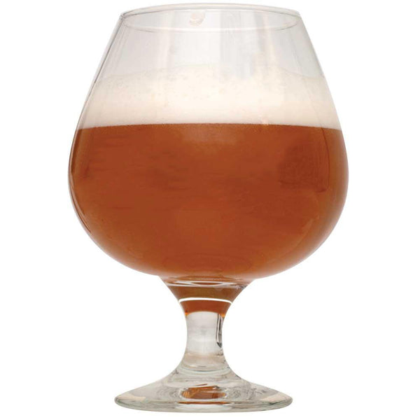 Shugga High Barleywine in a half-filled glass